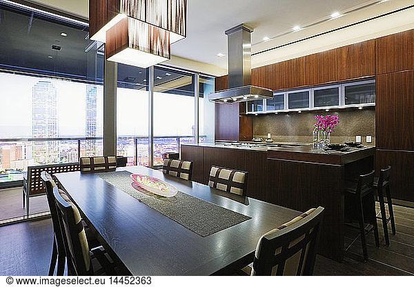 Kitchen and dining room in luxury highrise apartment
