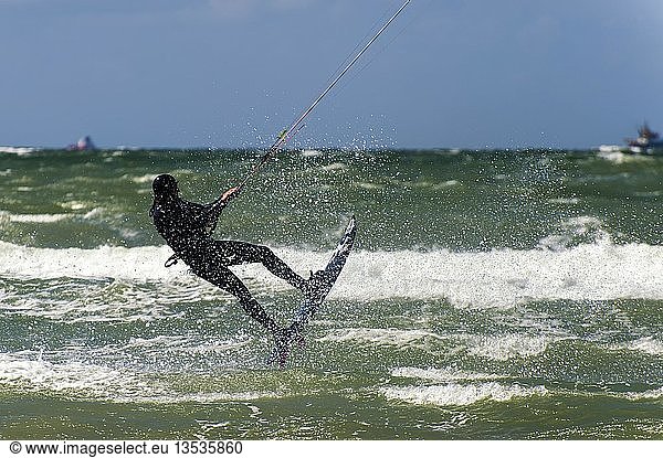 Kite surfer shortly before takeoff  strong winds  Warnemuende  Mecklenburg-Western Pomerania  Germany  Europe