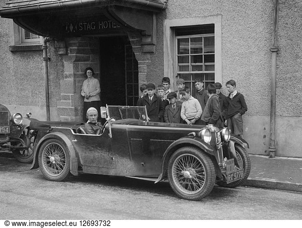 Kitty Brunell in her MG Magna outside the Stag Hotel  Edinburgh  RSAC Scottish Rally  1932. Artist: Bill Brunell.