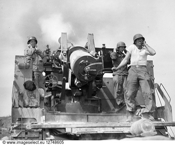 KOREAN WAR: ARTILLERYMEN. U.S. artillerymen firing an eight-inch self-propelled gun against a Communist-held position at the Korean front. Photograph  1952.