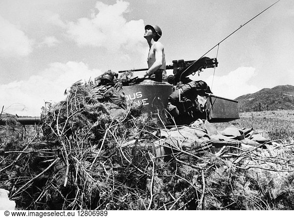 KOREAN WAR: TANK  1950. The commander of a tank with U.S. Forces in South Korea  listens and watches for enemy aircrafts  July 1950.
