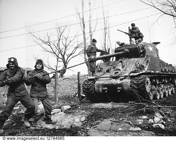 KOREAN WAR: TANK  1951. The crew of an Allied tank uses a lull in fighting near the Korean central front north of Wonju  to clean weapons  15 February 1951.