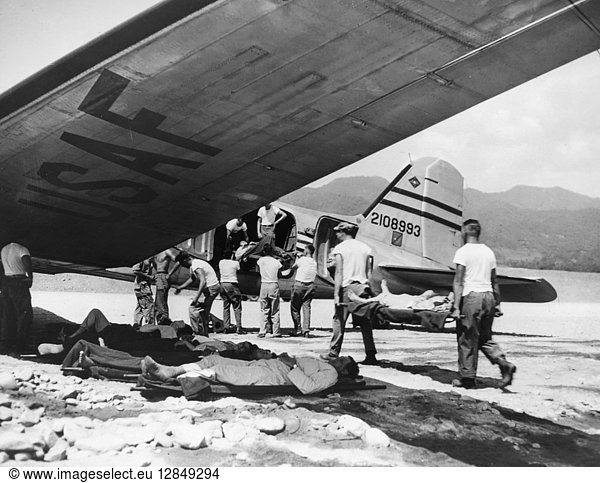 KOREAN WAR: WOUNDED  1952. American soldiers  wounded in heavy action at the front  are evacuated by a C-47 transport aircraft to rear areas  September 1952.