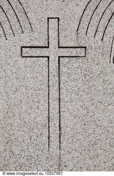 Kreuz auf Grabstein