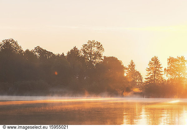 Lake during sunrise  Germany