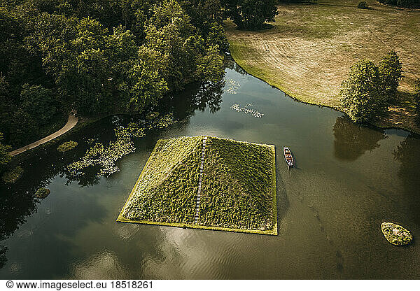 Lake with green pyramid in Park Branitz  Cottbus  Germany