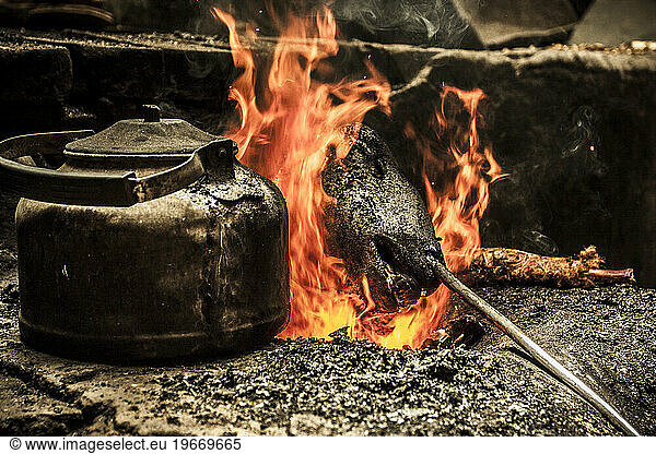 Lamb's head being burned in a fire.
