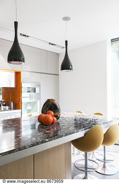 Lamps and vase in modern kitchen