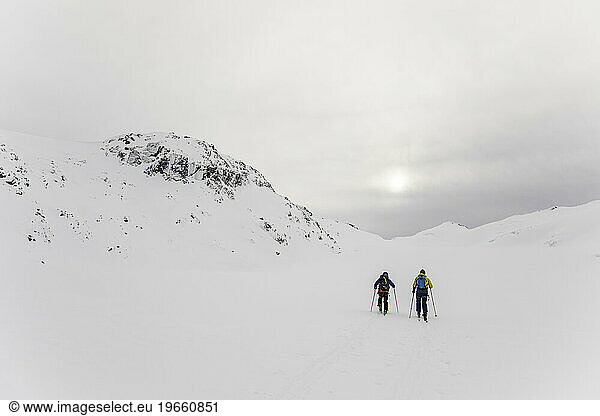 Landscape view of ski touring in the backcountry