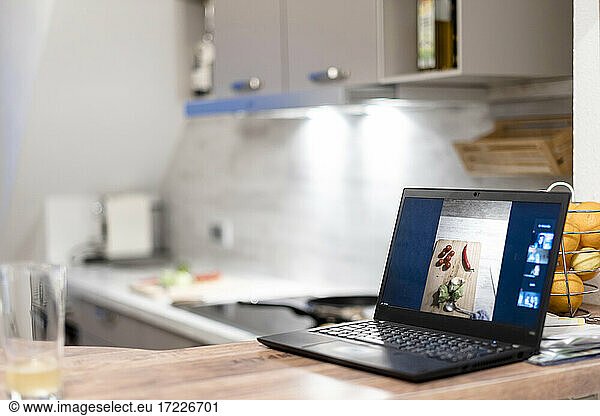 Laptop in kitchen at home