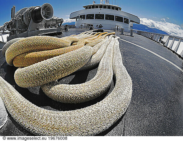 Large and thick cables  ropes on a deck of passenger ferry.