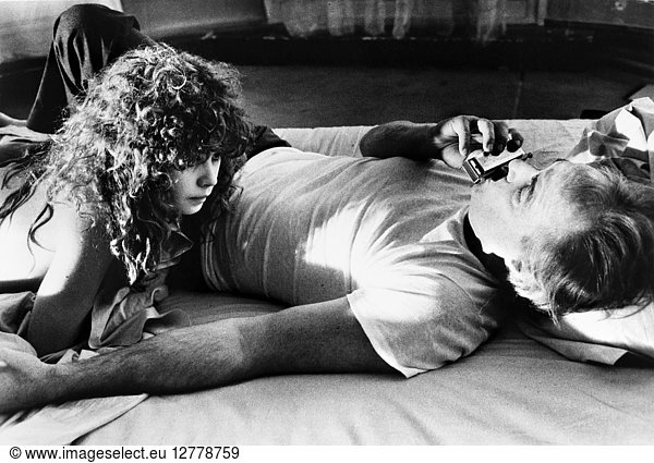 LAST TANGO IN PARIS  1973. Marlon Brando and Maria Schneider in a scene from the film 'Last Tango in Paris ' directed by Bernardo Bertolucci  1973.