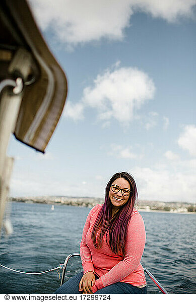 Late Thirties Hispanic Woman Sitting on Boat in Bay in San Diego
