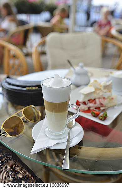 Latte coffee on a table in a cafe