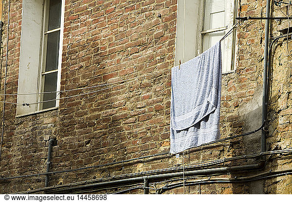 Laundry Hanging from Line  Tuscany  Italy