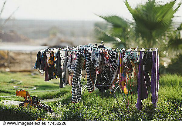 laundry hanging outside the house to dry