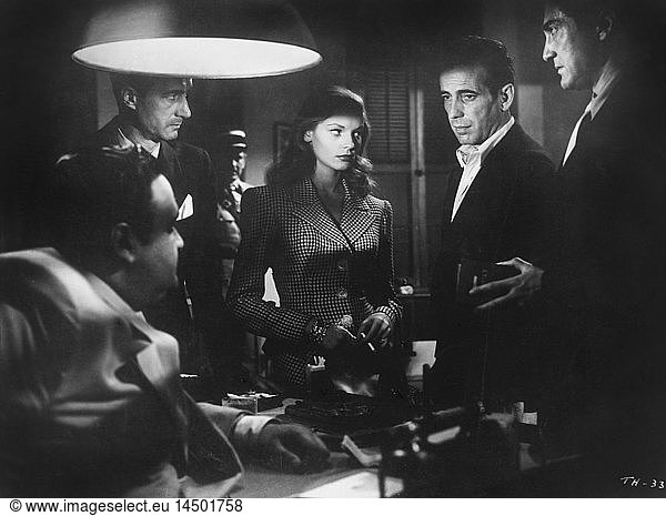 Lauren Bacall and Humphrey Bogart with Group of People  on-set of the Film  To Have and Have Not  1944