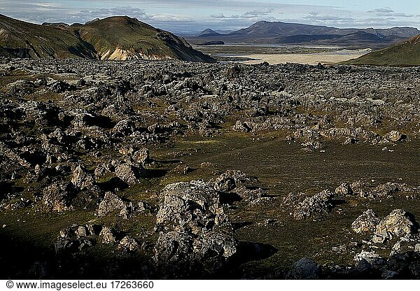 Lava rock  mountains  colored mountainsides  black lava tongue  Landmannalaugar  Fjallabaksleið  highlands  Central Iceland  Iceland  Europe