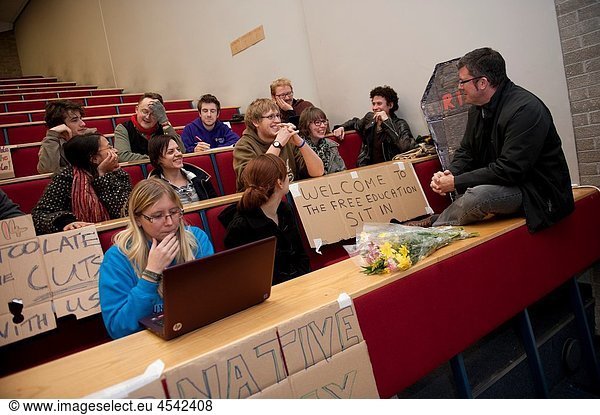 Lecturer in International Politics PETER JACKSON discussing the education cuts with students occupying the A12 lecture hall at Aberystwyth University December 13th  students of Aberystwyth University have started a teach-in in the main lecture hall on P