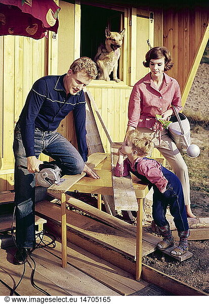 leisure  do-it-yourself (DIY)  man sawing boards  1960s