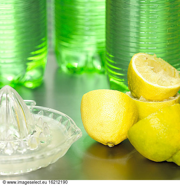 Lemons with lemon squeezer  close-up