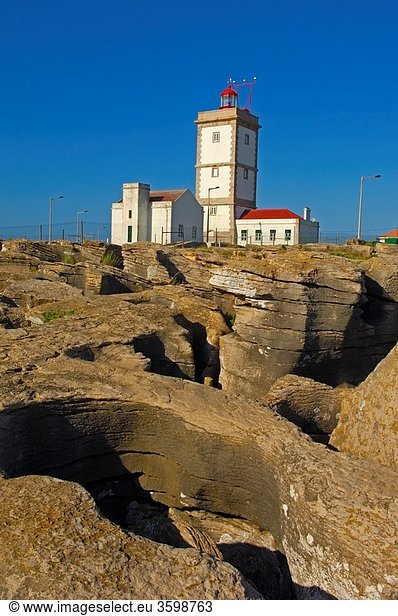 Lighthouse and Cliffs at Atlantic Coast. Carvoeiro cape. Peniche. Estremadura. Portugal.