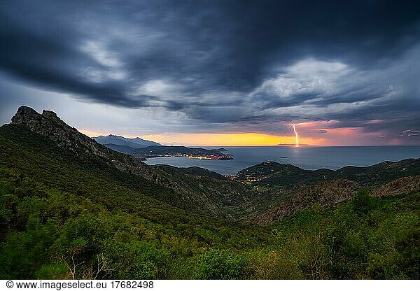 Lightning  thunderstorm  storm  panoramic view of the Gulf of Portoferraio  Volterraio Fortress on the left  sunset  Tuscan Archipelago  Elba Island  Livorno Province  Tuscany  Italy  Europe
