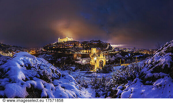 Lights of Toledo on after a winter snowstorm.
