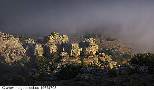 Lights on the rocks in the fog of the torcal de antequera. Spain