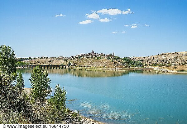 Linares reservoir and overview of the village. Maderuelo  Segovia province  Castilla Leon  Spain.