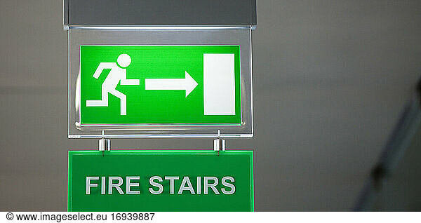 Lit emergency exit sign.