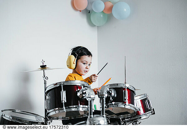 Little drummer excited to learn how to play drums