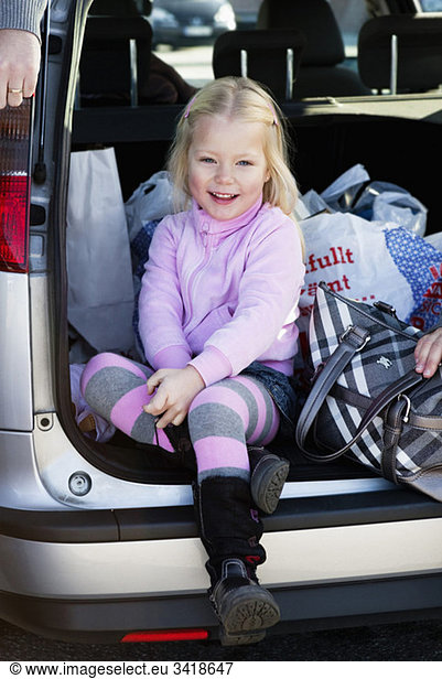 Little girl in trunk