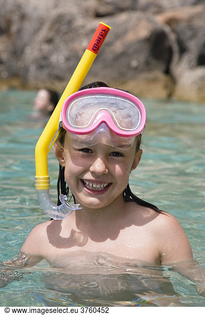 Little girl wearing diving goggles and snorkel  Croatia  Europe