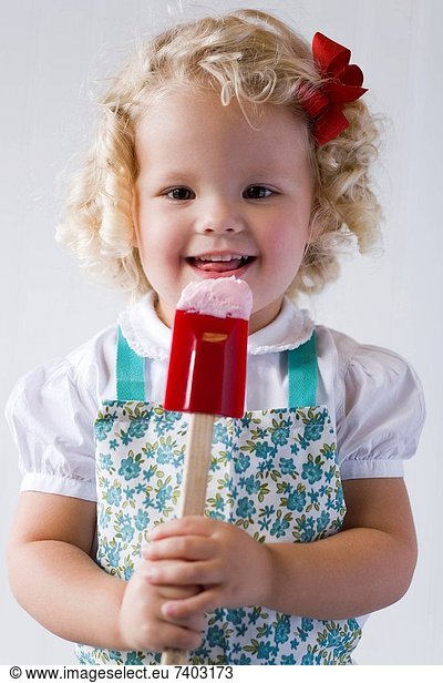 little girl with a spatula.