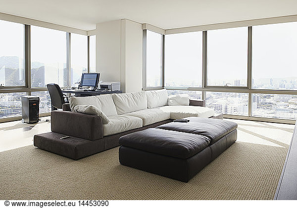 Living room and home office in luxury highrise apartment