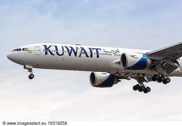London  10 July 2019: A Kuwait Airways Boeing 777-300ER aircraft with registration mark 9K-AOI is landing at Heathrow Airport (LHR) in the United Kingdom  United Kingdom  Europe