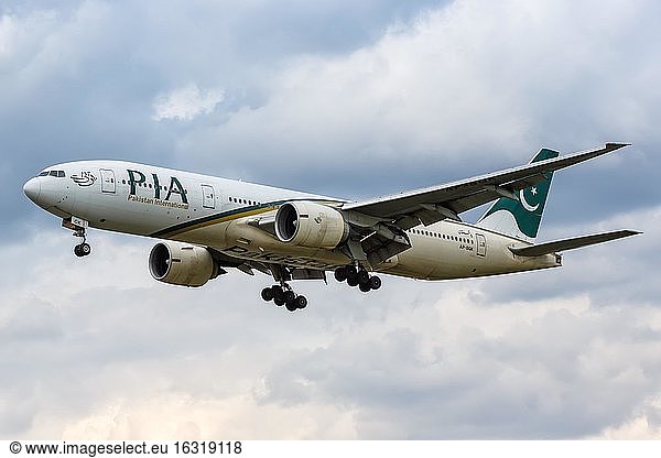London  10 July 2019: A PIA Pakistan International Boeing 777-200ER aircraft with registration mark AP-BGK lands at Heathrow Airport (LHR) in the United Kingdom  United Kingdom  Europe