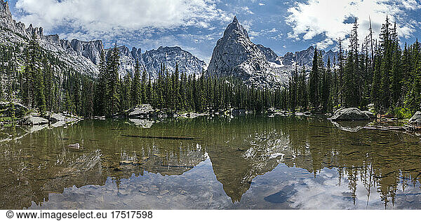 Lone Eagle Peak reflecting in glassy pond