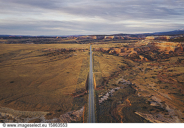Lonely Utah's road in the evening from above