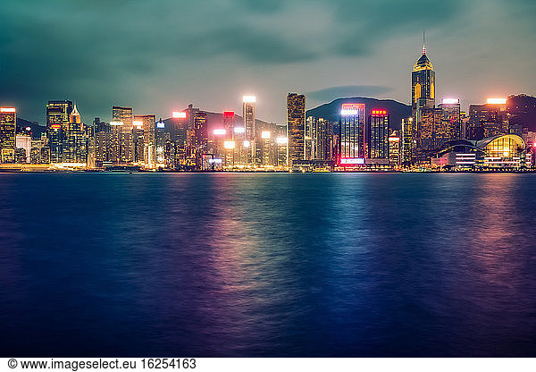 Long exposure at twilight of Hong Kong skyscrapers taken from Tsim Tsa Tsui; Hong Kong  Hong Kong Special Administrative Region (SAR)  Hong Kong