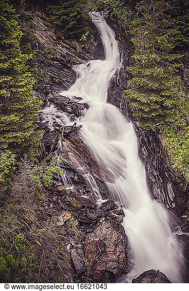 Long exposure of waterfall splashing in Central Eastern Alps