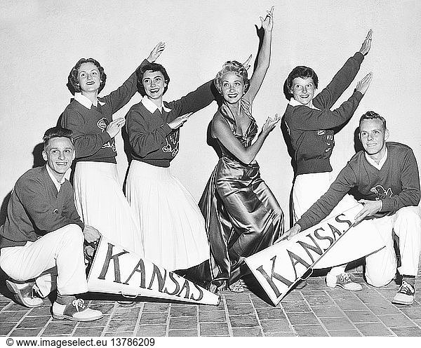 Los Angeles  California: September 25  1953 The Kansas cheerleader squad gets a guest star assist at the Ambassador Hotel.