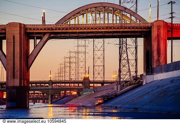 Los Angeles river embankment and 6th and 7th street bridges in the evening  Los Angeles  California  USA