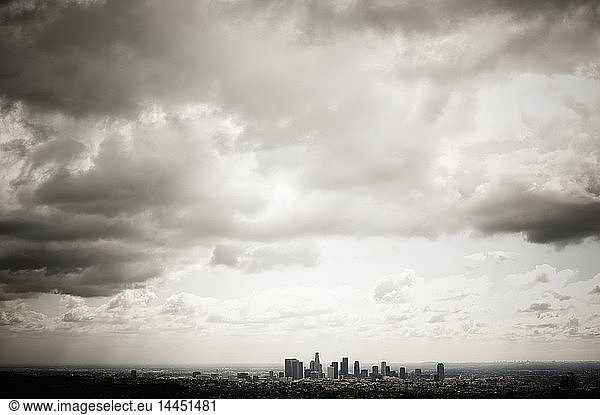 Los Angeles Skyline Beneath Cloudy Sky