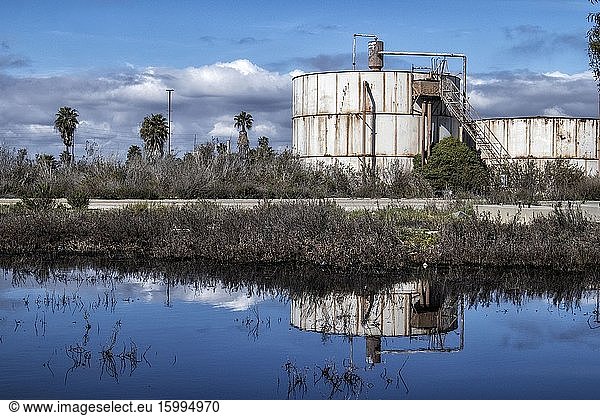 Los Cerritos Wetlands  once a thriving wetlands  is now mostly privately owned and used for oil extraction and processing operations. Long Beach  California  USA.