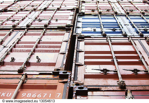Low angle view of cargo containers at commercial dock