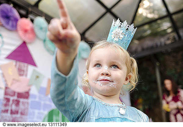 Low angle view of girl during princess party
