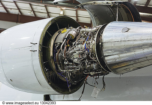 Low angle view of jet engine at airplane hanger
