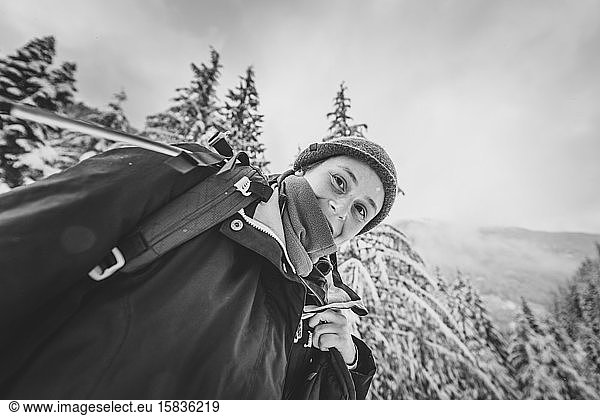 Low angle view Portrait of young woman in Manning Park Black and white